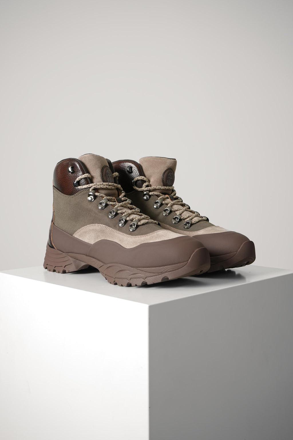 Brunello Cucinelli Rubber-effect calfskin and suede boots