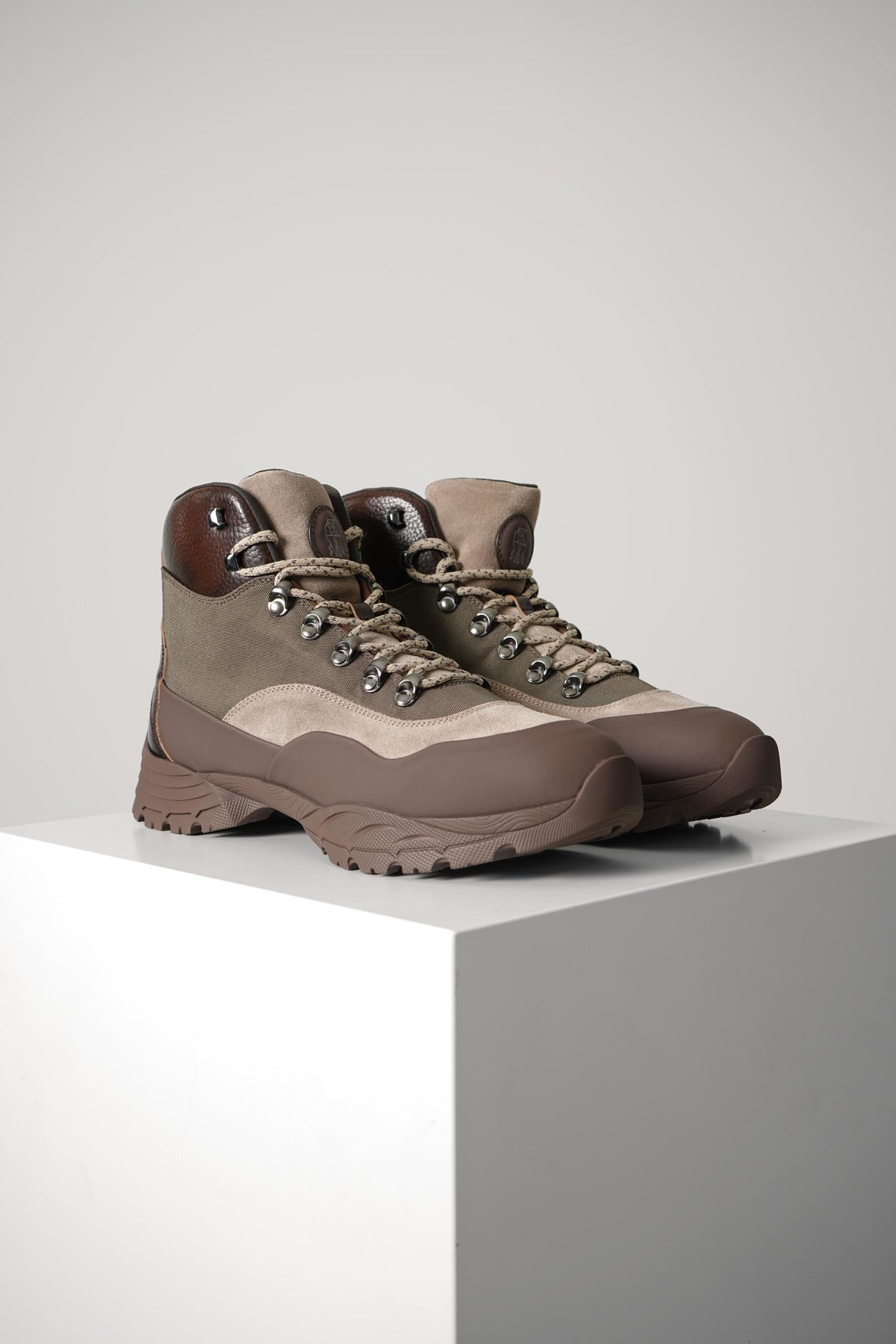 Brunello Cucinelli Rubber-effect calfskin and suede boots