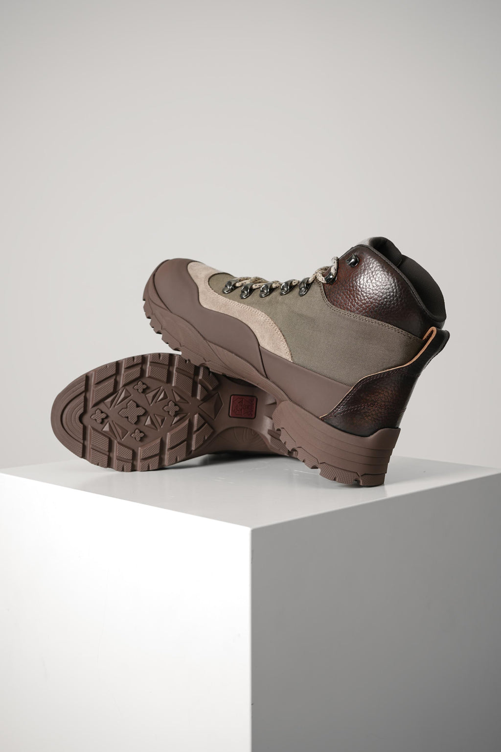 Brunello Cucinelli Rubber-effect calfskin and suede boots